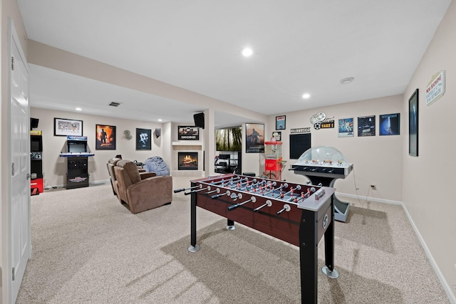 5214 381st Ln, North Branch, MN 55056 - game room with a tiled fireplace, recessed lighting, baseboards, and carpet floors