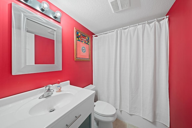 5214 381st Ln, North Branch, MN 55056 - bathroom featuring toilet, a textured ceiling, visible vents, and vanity