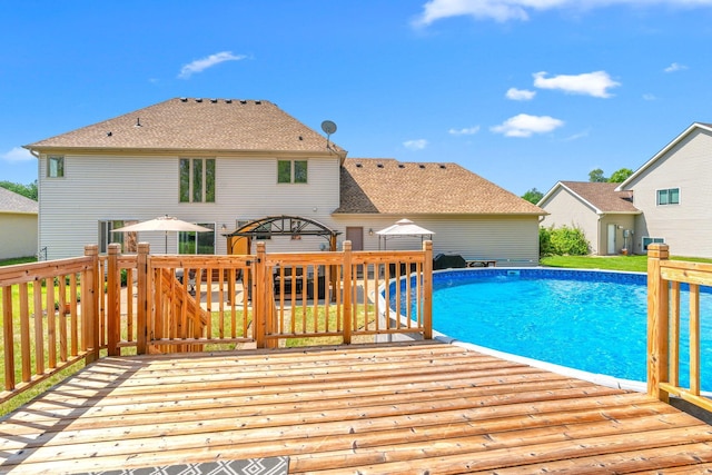 5214 381st Ln, North Branch, MN 55056 - view of swimming pool with a wooden deck
