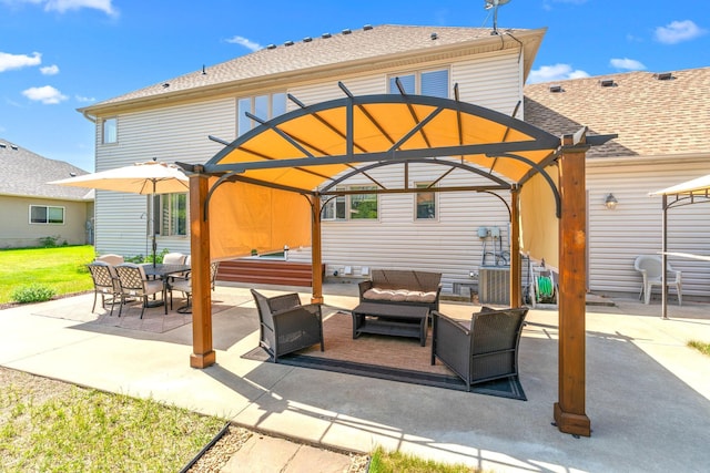 5214 381st Ln, North Branch, MN 55056 - view of patio / terrace featuring an outdoor hangout area, a pergola, a gazebo, and outdoor dining space