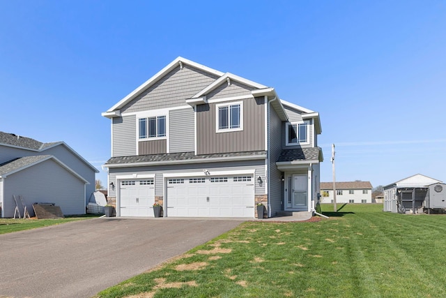 1101 8th Ave SW, Isanti, MN 55040 - view of front of home with driveway, a garage, board and batten siding, stone siding, and a front yard