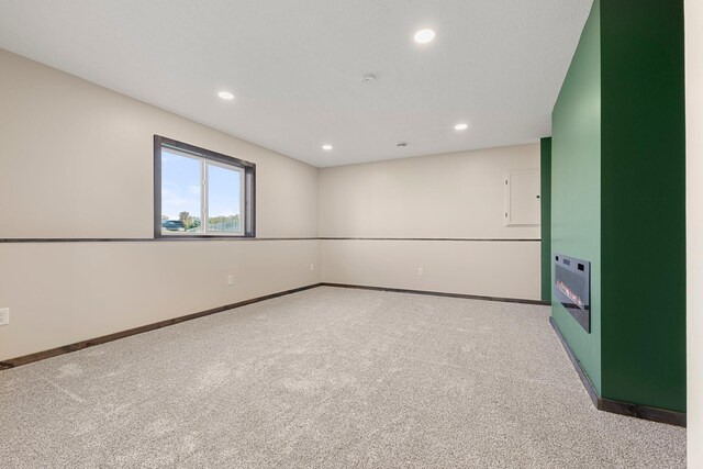 1101 8th Ave SW, Isanti, MN 55040 - carpeted spare room featuring recessed lighting and baseboards