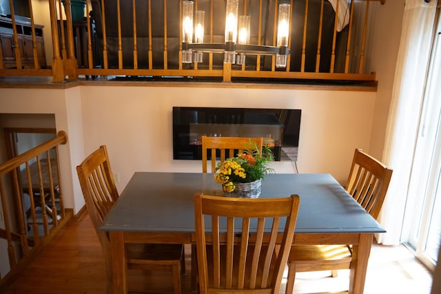 dining space featuring wood finished floors