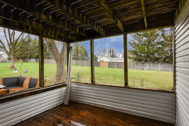 unfurnished sunroom with plenty of natural light