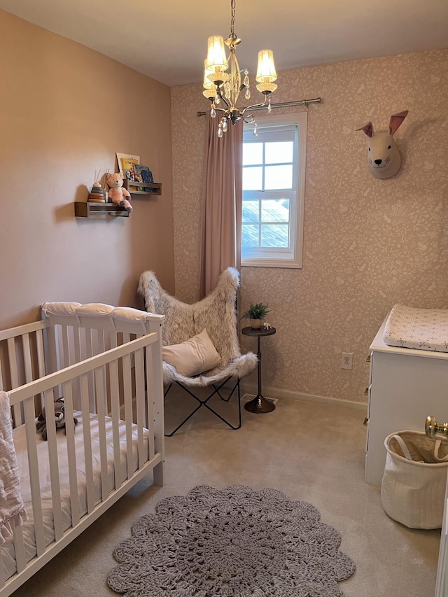 carpeted bedroom with baseboards, wallpapered walls, and an inviting chandelier
