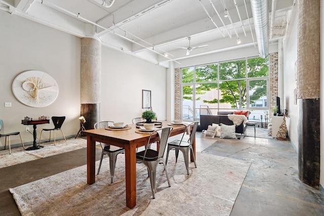 700 Washington Ave N Unit 210, Minneapolis, MN 55401 - dining area with concrete flooring and a ceiling fan