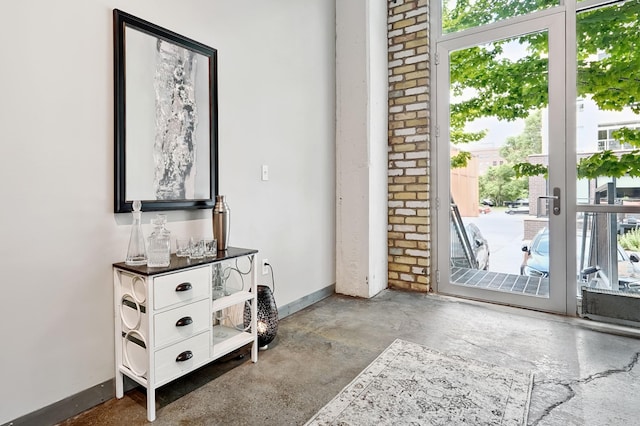 700 Washington Ave N Unit 210, Minneapolis, MN 55401 - entryway featuring healthy amount of natural light and concrete flooring