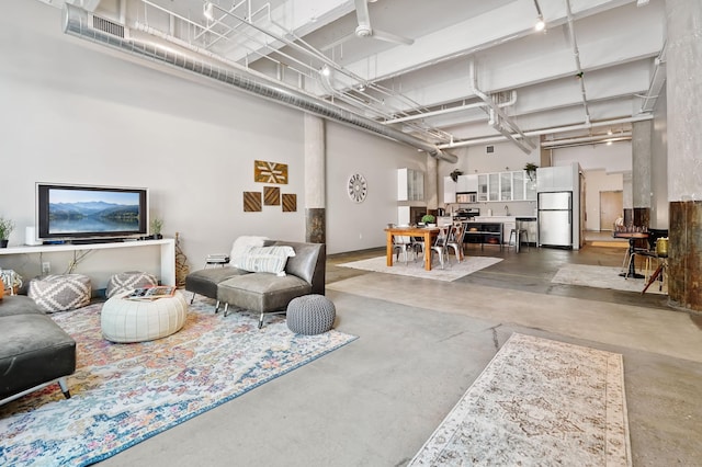 700 Washington Ave N Unit 210, Minneapolis, MN 55401 - living room with concrete floors and a high ceiling