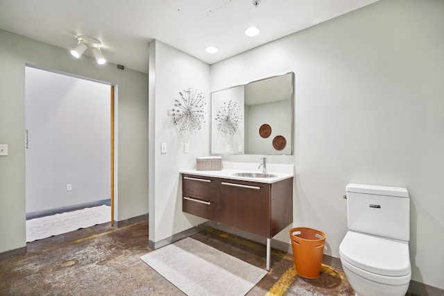 700 Washington Ave N Unit 210, Minneapolis, MN 55401 - bathroom featuring unfinished concrete floors, vanity, and recessed lighting