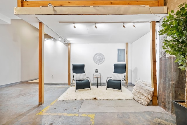 700 Washington Ave N Unit 210, Minneapolis, MN 55401 - sitting room featuring rail lighting, electric panel, and concrete flooring