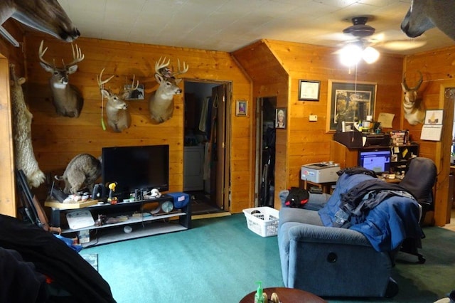 338 40th St, Clear Lake, WI 54005 - living area featuring wooden walls, ceiling fan, and carpet