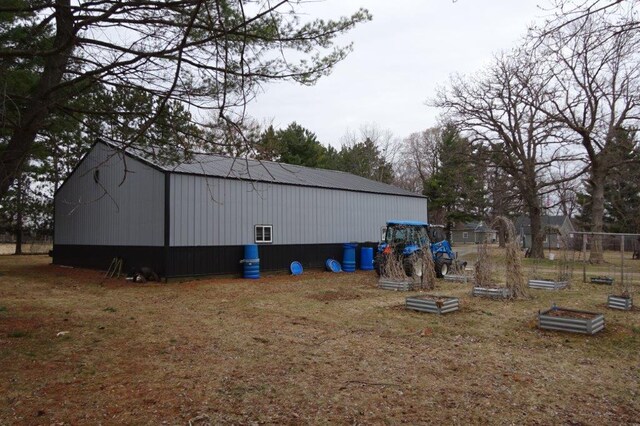 338 40th St, Clear Lake, WI 54005 - view of pole building featuring a garden
