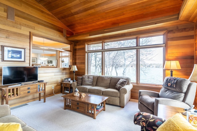 living room featuring wooden walls, wood ceiling, carpet, and lofted ceiling