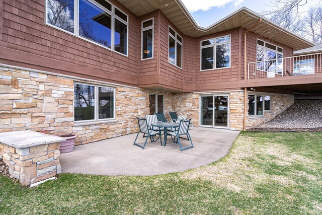 view of patio / terrace with a balcony