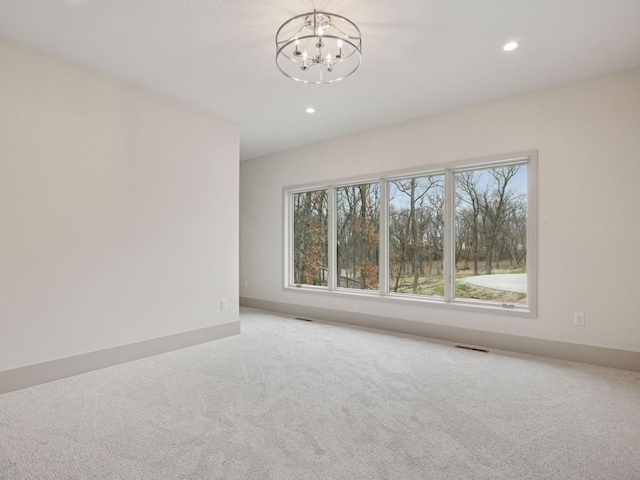 5010 Millie Rd SW, Rochester, MN 55902 - empty room with carpet floors, recessed lighting, baseboards, and a chandelier