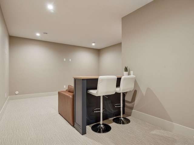 5010 Millie Rd SW, Rochester, MN 55902 - bar featuring carpet flooring, recessed lighting, baseboards, and a dry bar