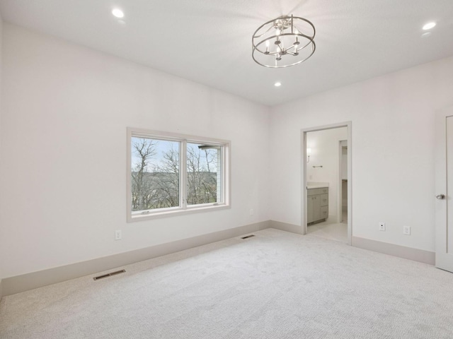 5010 Millie Rd SW, Rochester, MN 55902 - unfurnished bedroom with visible vents, recessed lighting, a chandelier, and light carpet
