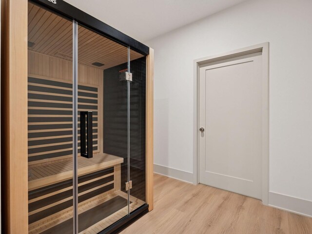 5010 Millie Rd SW, Rochester, MN 55902 - view of sauna / steam room with baseboards and wood finished floors