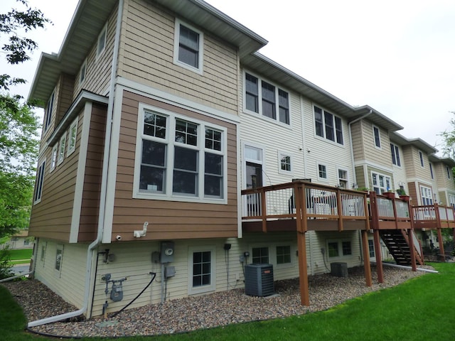 1907 Red Maple Ln, Northfield, MN 55057 - rear view of property with a deck, stairs, and a lawn