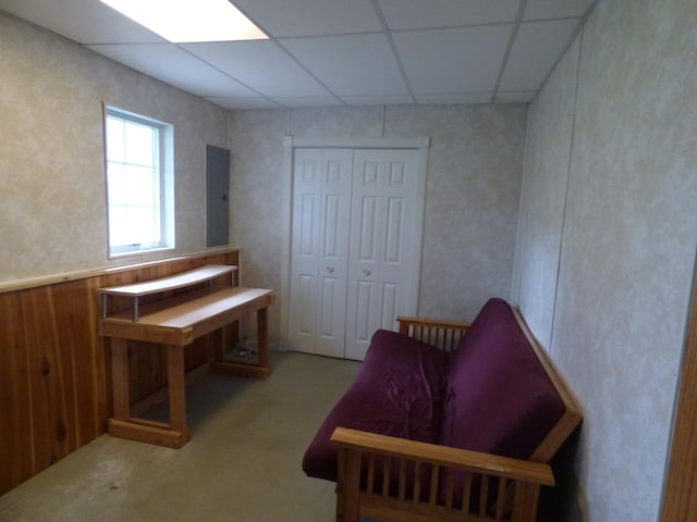 1907 Red Maple Ln, Northfield, MN 55057 - living area featuring a drop ceiling, electric panel, carpet, and wallpapered walls