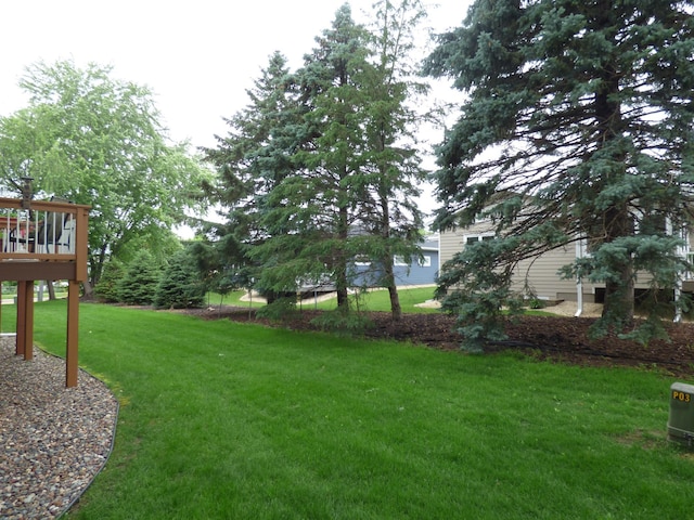 1907 Red Maple Ln, Northfield, MN 55057 - view of green lawn featuring a deck
