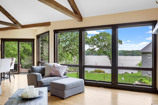 3420 Fairview Ave N, Arden Hills, MN 55112 - living room featuring beam ceiling, a water view, light wood-style floors, and high vaulted ceiling