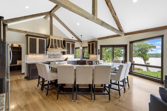 3420 Fairview Ave N, Arden Hills, MN 55112 - dining space with high vaulted ceiling, beam ceiling, light wood-style flooring, and recessed lighting