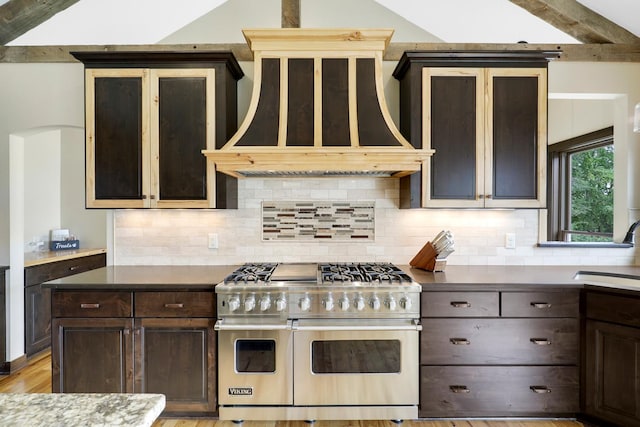 3420 Fairview Ave N, Arden Hills, MN 55112 - kitchen featuring double oven range, range hood, backsplash, lofted ceiling, and light wood-style floors