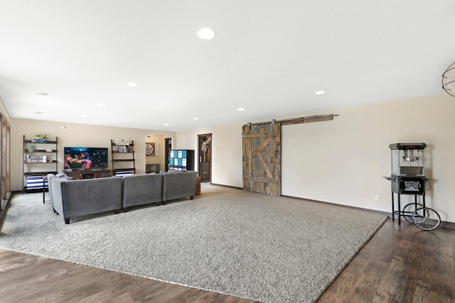 3420 Fairview Ave N, Arden Hills, MN 55112 - living room featuring a barn door, wood finished floors, recessed lighting, and baseboards