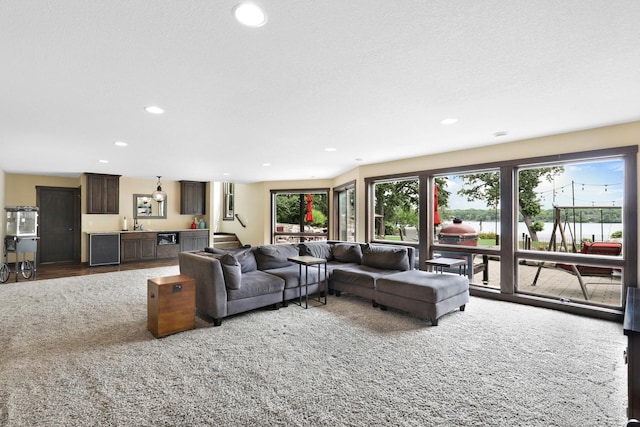 3420 Fairview Ave N, Arden Hills, MN 55112 - living area featuring bar area, plenty of natural light, recessed lighting, wine cooler, and carpet floors