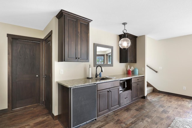 3420 Fairview Ave N, Arden Hills, MN 55112 - kitchen with a sink, dark wood finished floors, light countertops, and baseboards