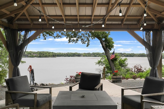3420 Fairview Ave N, Arden Hills, MN 55112 - view of patio / terrace with a water view, an outdoor living space, and a gazebo