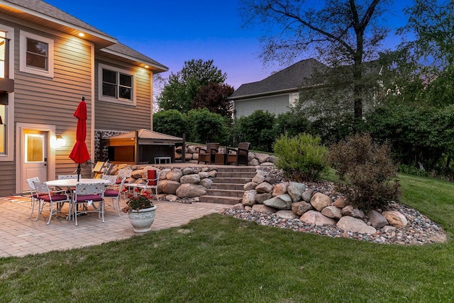 3420 Fairview Ave N, Arden Hills, MN 55112 - view of grassy yard featuring a patio area