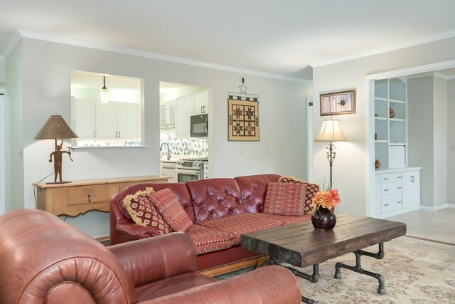 living room with crown molding and light tile patterned flooring