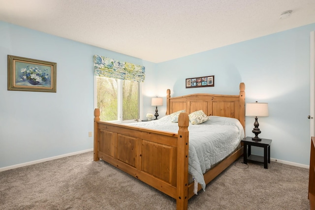 bedroom with light carpet and baseboards
