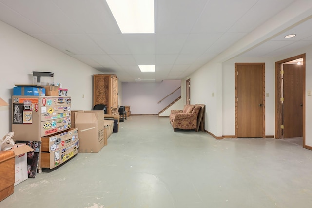 finished basement with a drop ceiling