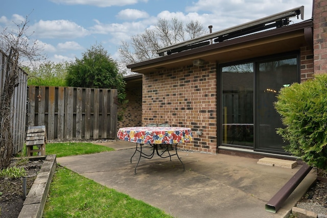 view of patio with fence