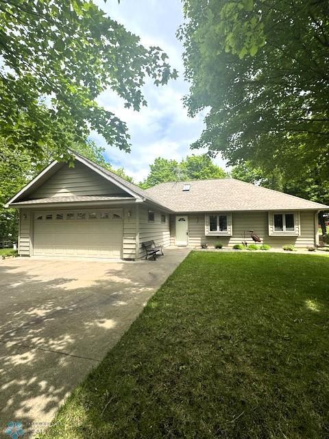 38227 County Highway 34, Maple Grove Twp, MN 56569 - ranch-style home featuring concrete driveway, a garage, and a front yard
