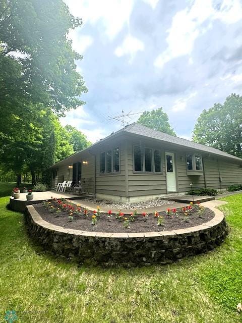 38227 County Highway 34, Maple Grove Twp, MN 56569 - rear view of house with a patio area and a yard