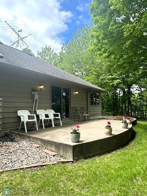 38227 County Highway 34, Maple Grove Twp, MN 56569 - back of property featuring a patio and a yard
