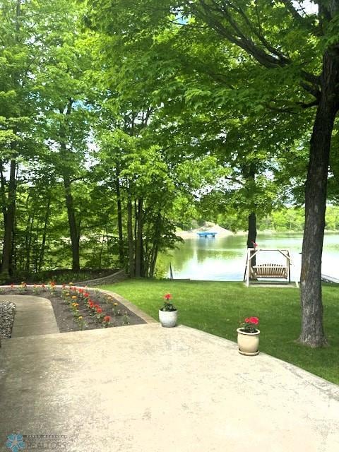 38227 County Highway 34, Maple Grove Twp, MN 56569 - view of property's community featuring a water view, a lawn, and view of wooded area