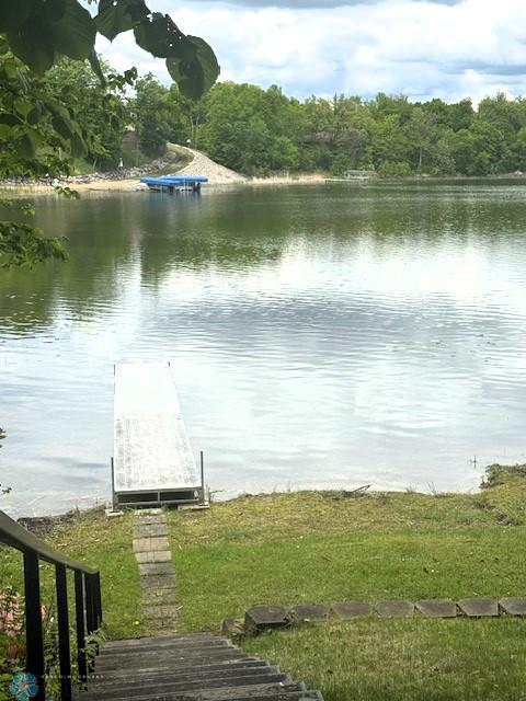 38227 County Highway 34, Maple Grove Twp, MN 56569 - dock with a water view and a wooded view