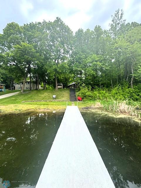 38227 County Highway 34, Maple Grove Twp, MN 56569 - dock area with a water view and a lawn