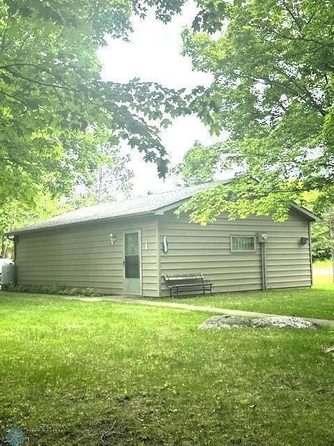 38227 County Highway 34, Maple Grove Twp, MN 56569 - rear view of house with a lawn