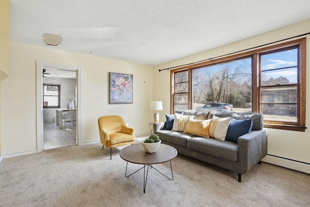 living room featuring a baseboard radiator, carpet flooring, a textured ceiling, and baseboards