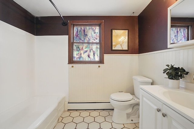 full bathroom featuring vanity, shower / bath combination, toilet, a wainscoted wall, and baseboard heating
