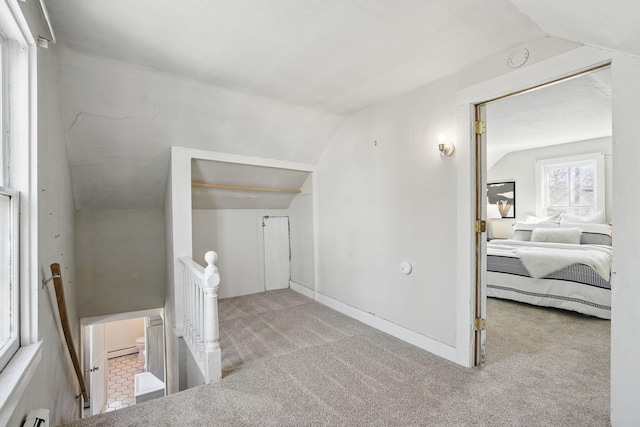 interior space featuring vaulted ceiling