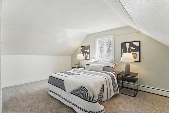 bedroom featuring baseboards, carpet floors, a baseboard radiator, and vaulted ceiling