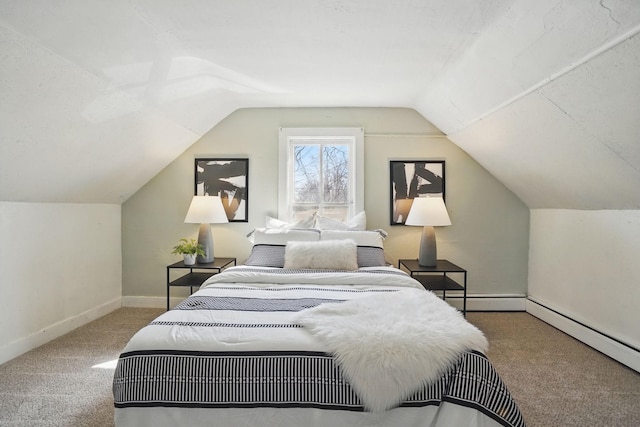 bedroom featuring a baseboard heating unit, vaulted ceiling, carpet, and baseboards