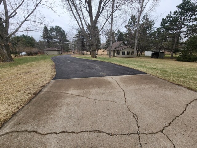 view of road with driveway